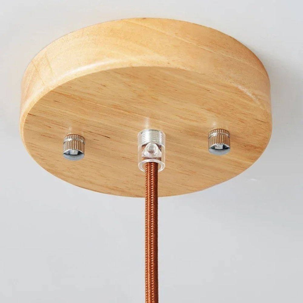 Minimalistyczna lampa wisząca o delikatnym blasku