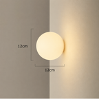 Nowoczesna kinkietowa lampa ścienna LED z kulą ze szkła w stylu ambient